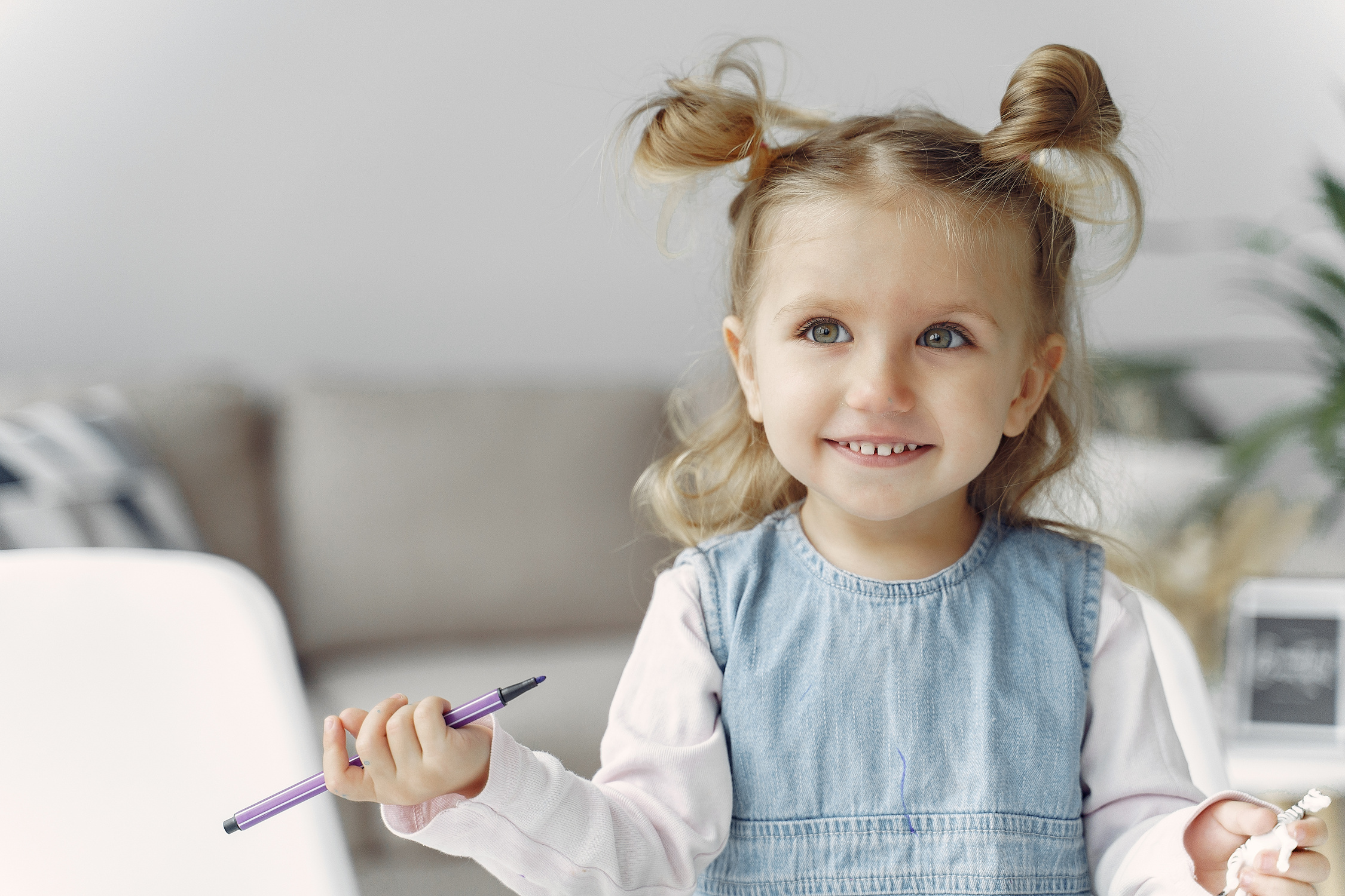 Cute Little Girl Holding Purple Color Pen